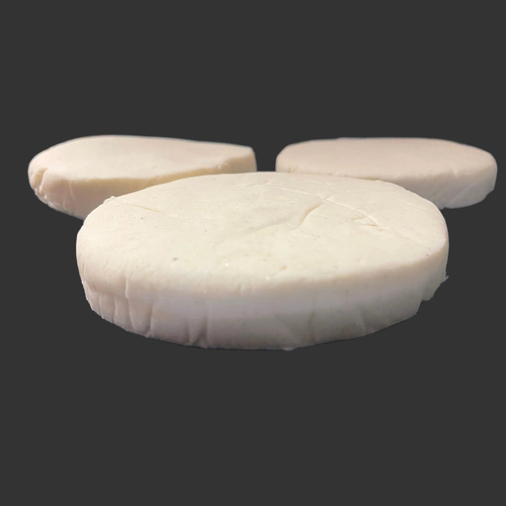 Uncooked and freshly shaped Classic Arepa: Perfect to enjoy with cheese, butter, eggs, avocado, meats, or any topping you love