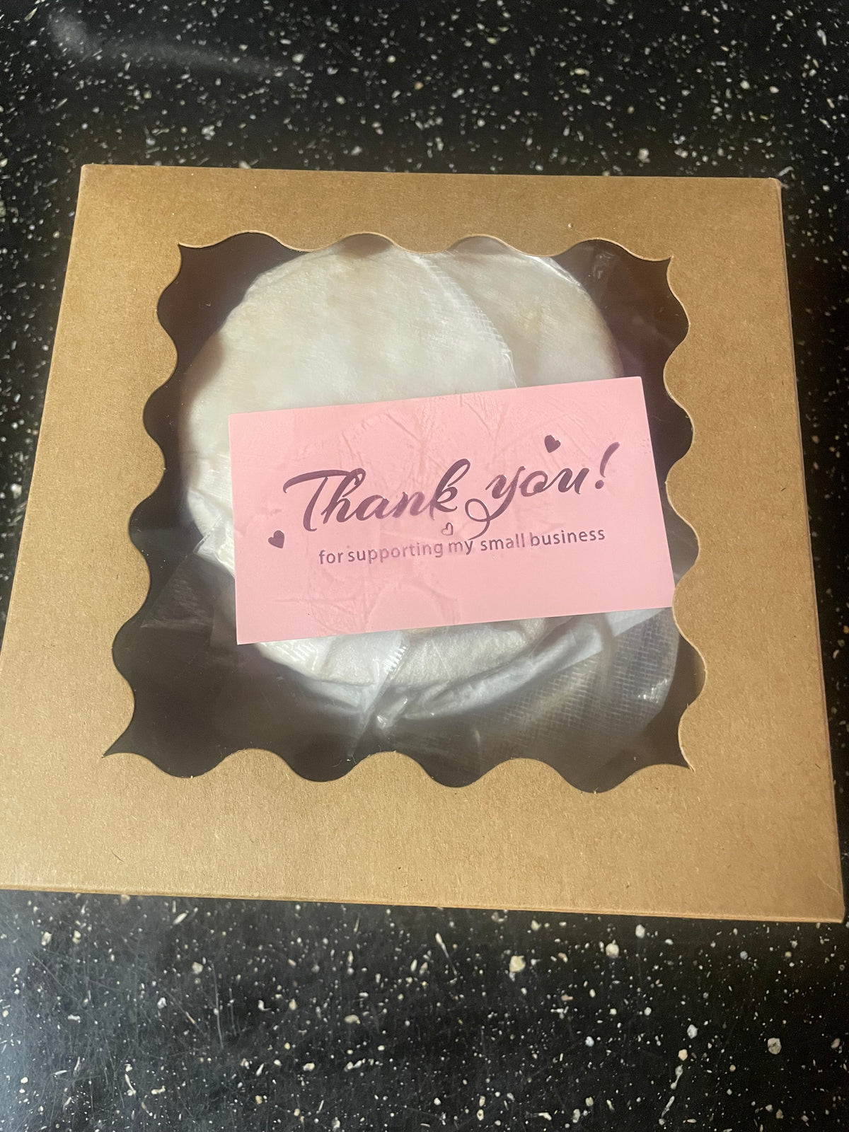 Five-pack of Classic White Corn arepas in sealed packaging beside the box.